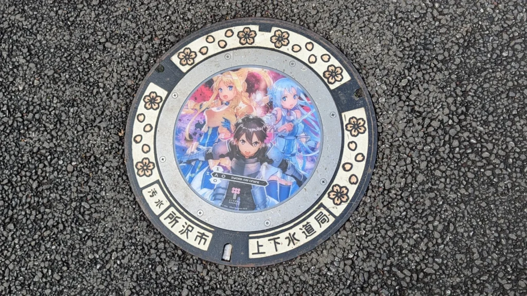 Tokorozawa sewer cover featuring Sword Art Online characters